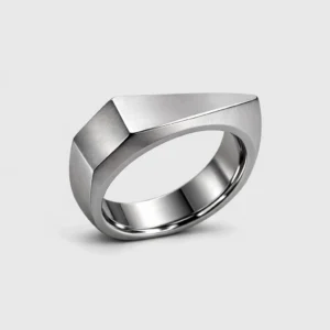 image of a gemotric ring on beige clean background